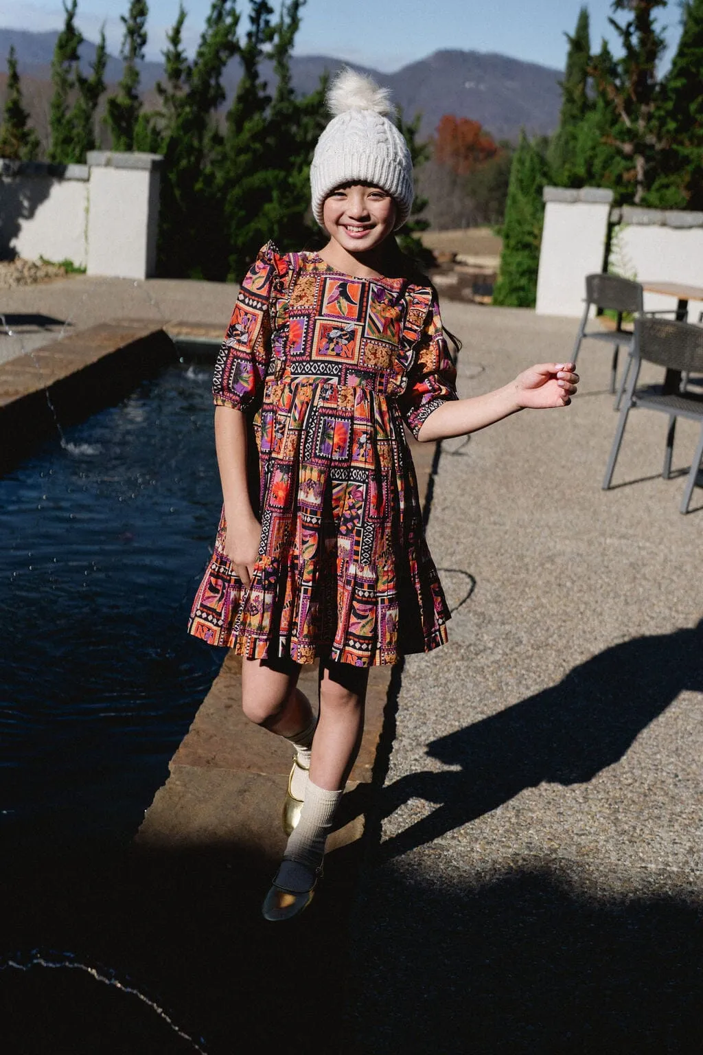 Girls Kelly Ruffle Bib Dress - Stamp