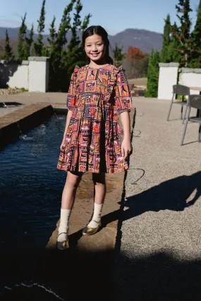 Girls Kelly Ruffle Bib Dress - Stamp