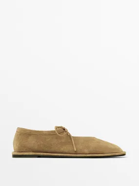 Tied split suede ballet flats
